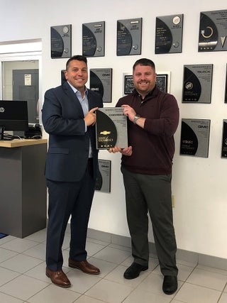 Joe Romeo, Owner and Mike Casella, Chevy Sales Manager accept the coveted GM Mark Of Excellence Award | Romeo Chevrolet Buick GMC in Lake Katrine NY