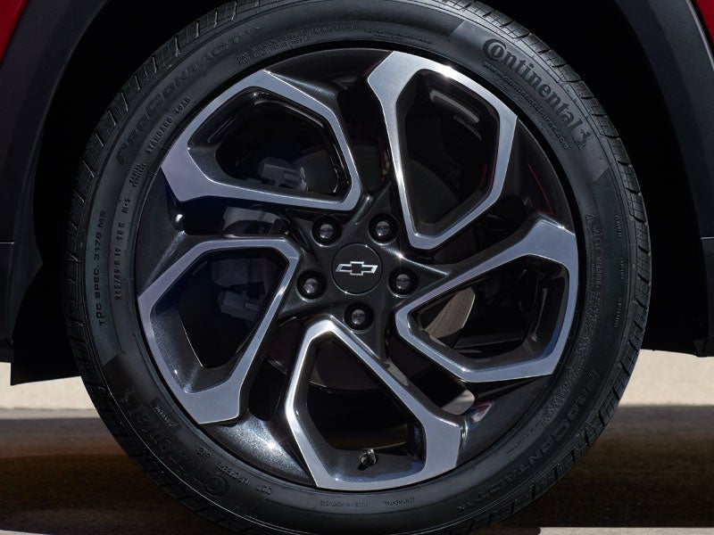 Chevrolet wheel and tire showing the tread and wheel design